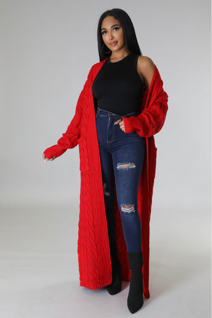 This Long sweater Cardigan features pockets and an oversized fit, perfect for keeping warm during colder months. Crafted from quality materials, this cardigan is sure to be a fall and winter favorite red teal